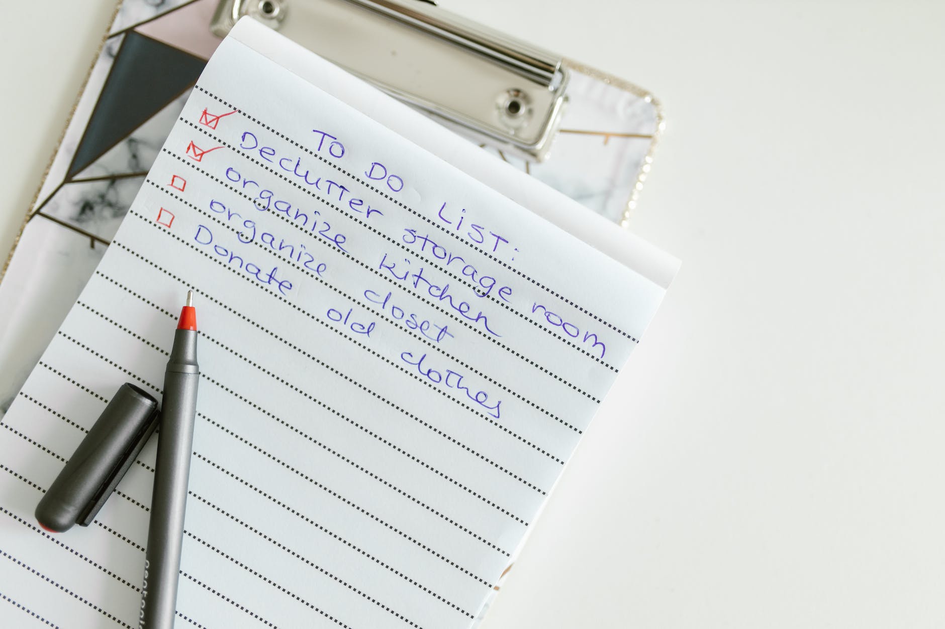 list written in a notepad with pen